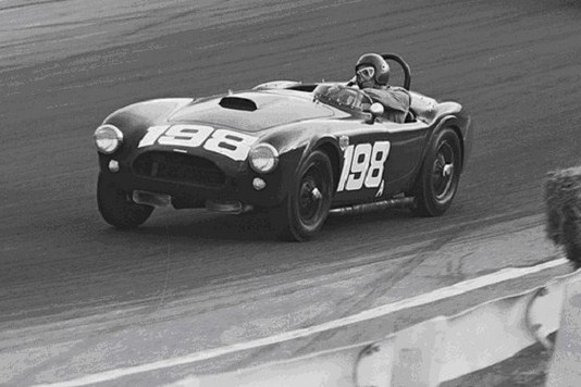 Dave MacDonald races the Carroll Shelby Cobra 260ci to its first ever win at Riverside International Raceway